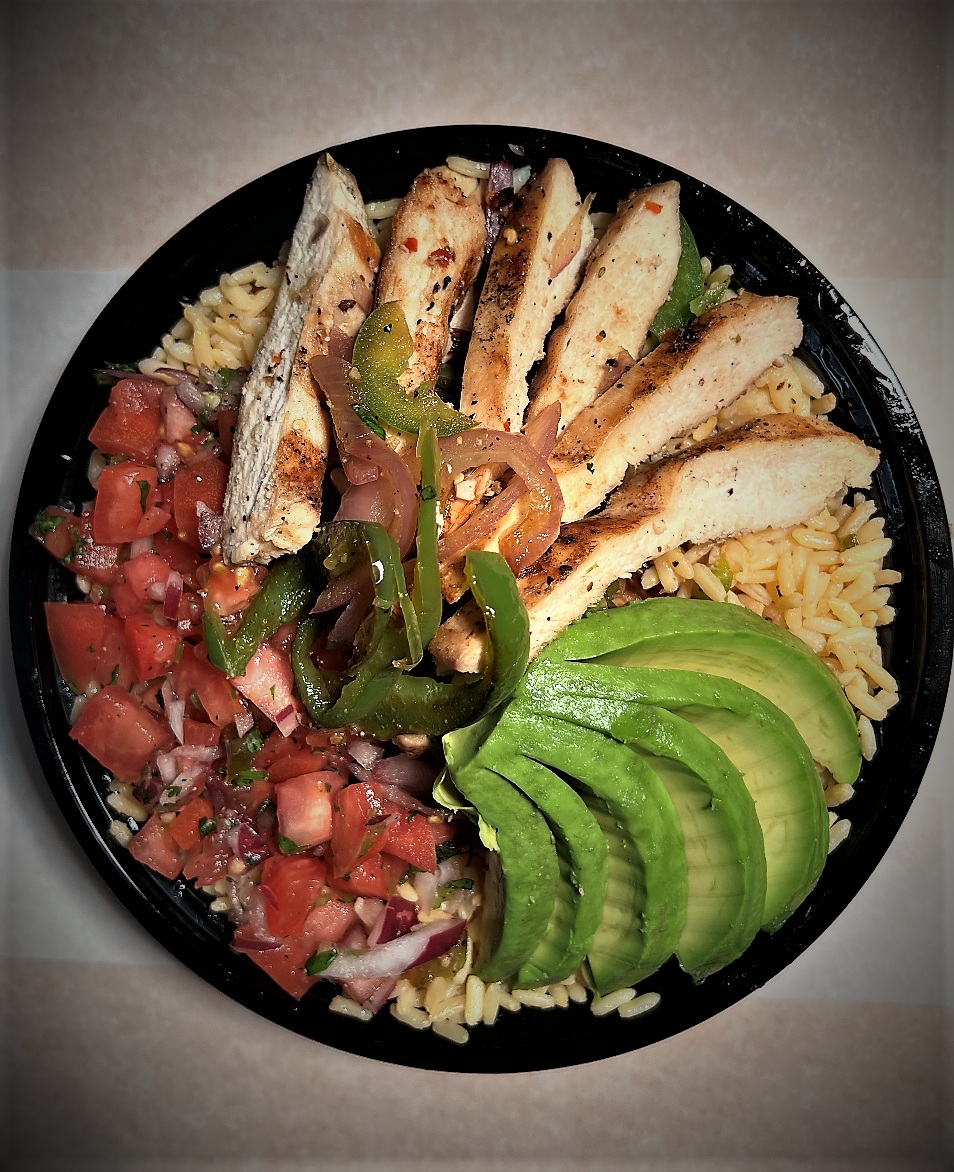 Chicken rice bowl with avocado and salsa.