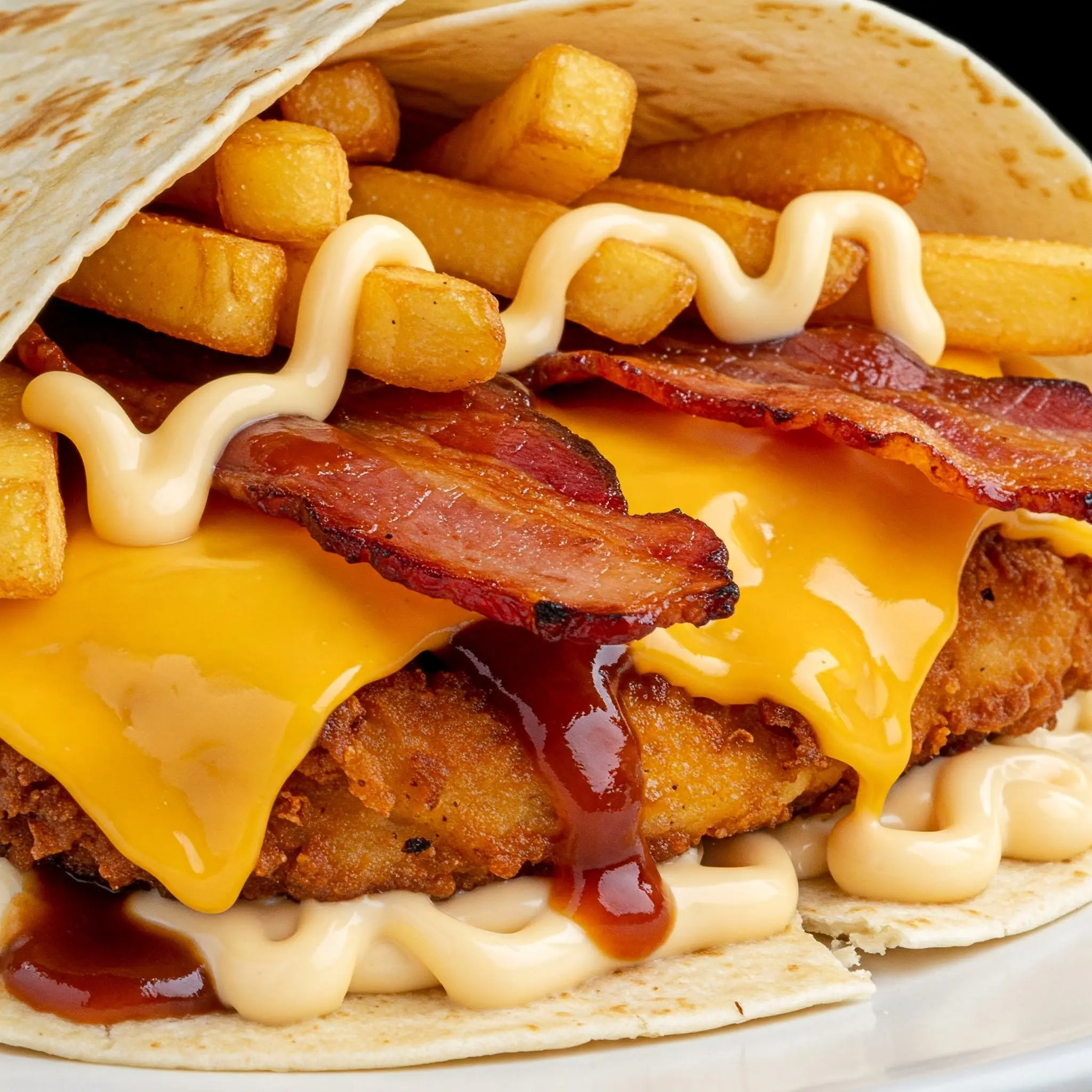 Taco with bacon, fries, and cheese.