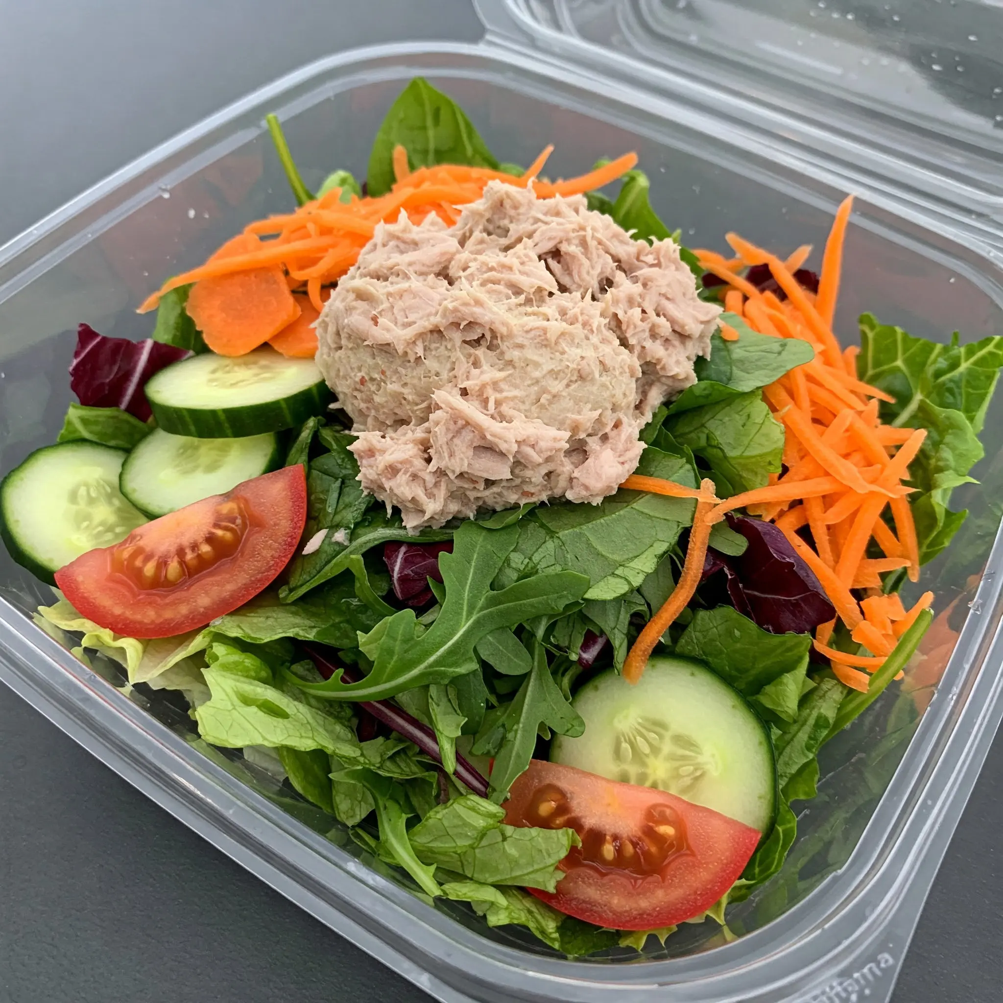Tuna salad with mixed greens and vegetables.