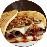 image-4 Sandwich with roast beef and melted cheese.