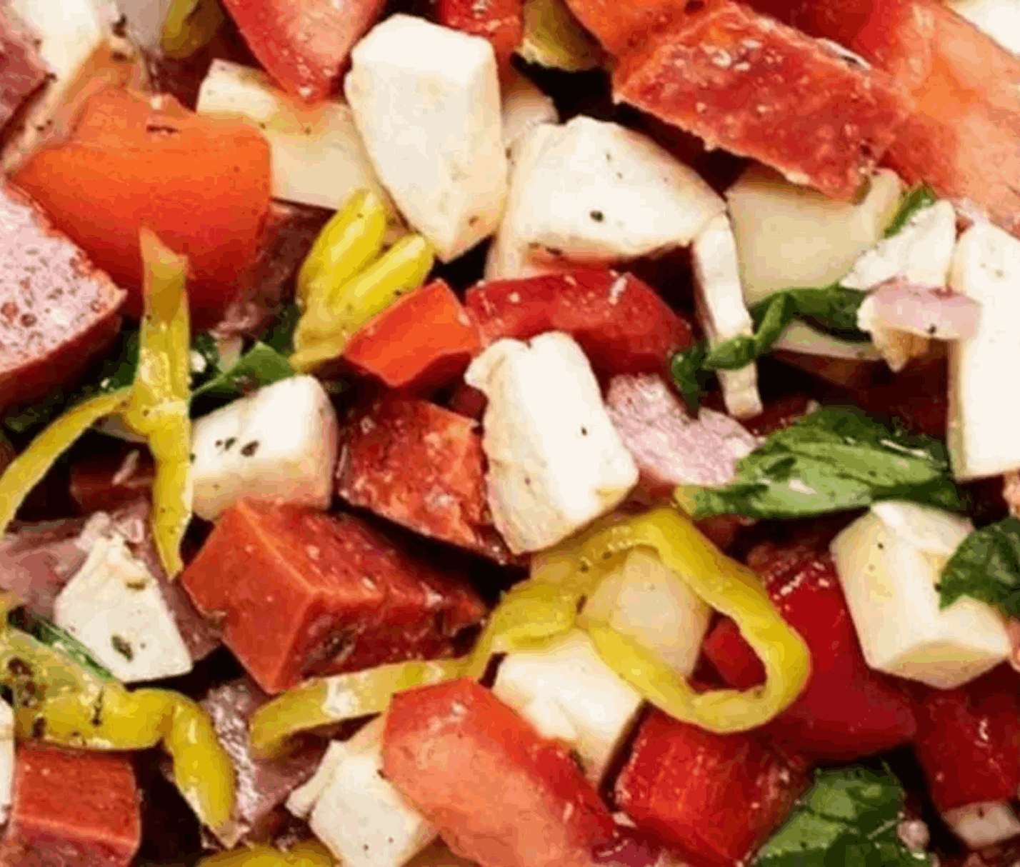 Colorful salad with cheese and vegetables.