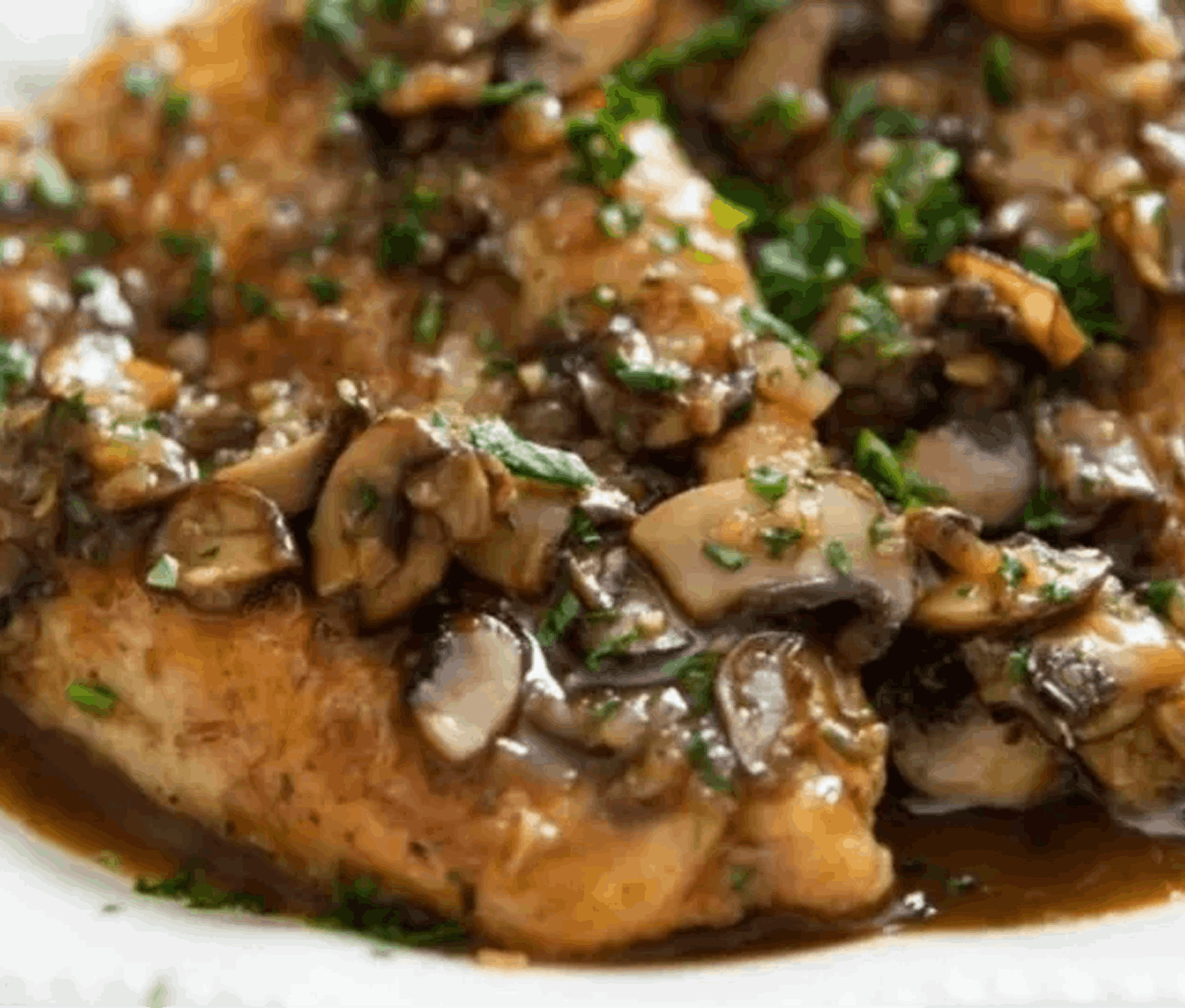 Chicken marsala with mushrooms and herbs.